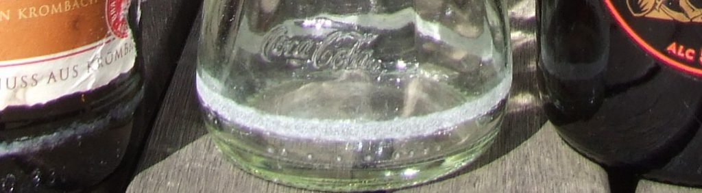 Picture showing wear on reused bottles