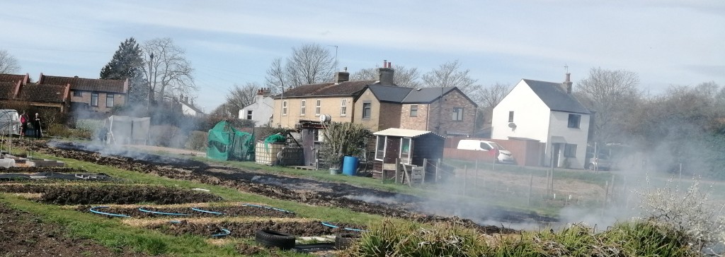 Picture showing an allotment being burned off.